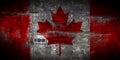 Grungy Flag of Canada on stone texture background closeup Royalty Free Stock Photo