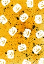 A grungy Halloween pattern background with Jack o lanterns in watercolor