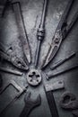 Grungy old metalwork tools on old stained table background photo processing cross-process Royalty Free Stock Photo