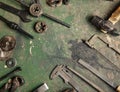 Grungy old metalwork tools on stained table background Royalty Free Stock Photo