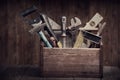 Grungy old tools on a wooden background Royalty Free Stock Photo