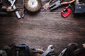 Grungy old tools on a wooden background Royalty Free Stock Photo