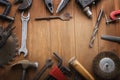 Grungy old tools on a wooden background Royalty Free Stock Photo