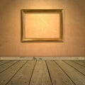 Grungy orange wall with frame