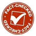 Grungy red round FACT-CHECKED label or rubber stamp with checkmark Royalty Free Stock Photo