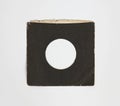 Grungy 45 rpm vinyl record envelope black in color on white background