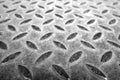 Grungy rust metal dimond floor with blur effect in black and white Royalty Free Stock Photo