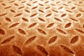 Grungy rust metal dimond floor with blur effect in orange tone Royalty Free Stock Photo