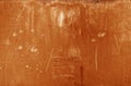 Grungy rusted metal wall surface in orange tone Royalty Free Stock Photo