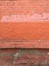 Grungy industrial urban painted red brick wall Royalty Free Stock Photo