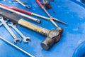 Grungy steel hammer with handyman tool Royalty Free Stock Photo