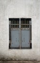 Grungy Window with Metal Shutters Royalty Free Stock Photo