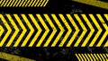 A grungy and worn hazard stripes texture. Abstract warning striped rectangular background, yellow and black stripes on the diagona Royalty Free Stock Photo