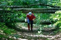 GRUNIVKA, SUMY REGION, UKRAINE - JUNE 21, 2021: Sportsman running through the forest on the race of SKIF Cup XIV sports