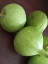 Grup of Ripe figs on a brown background