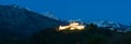 Gruyere, VD / Switzerland - 31 May 2019: panorama view the historic castle at Gruyere with mountain landscape at twilight