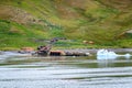 Grytviken shipwrecks of abandoned whaling station in South Georgia. Lost places with rusty tanks, old boats, Antarctica.