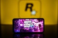 GTA VI logo and Rockstar games company logo in background on screen. Rockstar games announces to release GTA SIX video