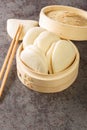 Gua bao, steamed buns in bamboo closeup, bao buns. Vertical Royalty Free Stock Photo