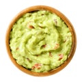 Guacamole, avocado dip, in wooden bowl Royalty Free Stock Photo