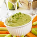 Guacamole with Carrot and Celery Sticks Royalty Free Stock Photo