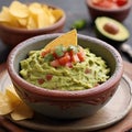 bowl with guacamole and tomatoes Royalty Free Stock Photo