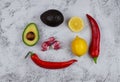 Guacamole ingredients on grey textured backround, top view Royalty Free Stock Photo