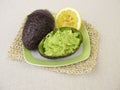 Guacamole with lemon in avocado peel