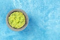 Guacamole in a molcajete, Mexican avocado dip in the typical stone mortar Royalty Free Stock Photo