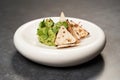 Guacamole with pita chips on white plate. Chef`s signature dish Royalty Free Stock Photo