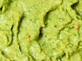 Guacamole sauce texture closeup. Mexican food