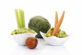 guacamole with vegetable sticks isolated on white. Royalty Free Stock Photo