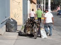 Guadalajara Jalisco, Mexico - April 12, 2021 : homeless indigent collecting garbage to recycle, reuse, sell and survive in the Royalty Free Stock Photo