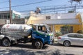 Guadalajara, Jalisco Mexico. December 27, 2022. Gas tanker truck supplying domestic gas to a residential house