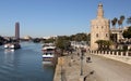 Guadalquivir River embankment with the 13th-century Golden Tower, Torre del Oro, Seville, Spain Royalty Free Stock Photo