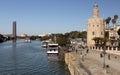 Guadalquivir River embankment with the 13th-century Golden Tower, Torre del Oro, Seville, Spain Royalty Free Stock Photo