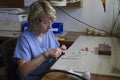 Guadalupe, Ecuador - May 27, 2014: Dental technician works on dentures