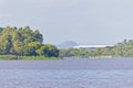 Guaiba lake with forest, island and Gremio Arena in background Royalty Free Stock Photo