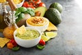 Guakamole and hummus dips with vegetables