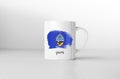 Guam flag on white coffee mug.