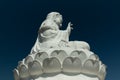 Guan Yin statue at Wat Huay Pla Kang temple, sitting Buddha on lotus flower, Chiang Rai, Thailand Royalty Free Stock Photo