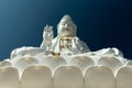 Guan Yin statue at Wat Huay Pla Kang temple, sitting Buddha on lotus flower, Chiang Rai, Thailand Royalty Free Stock Photo