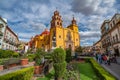 Guanajuato, Mexico - February 26, 2020: Plaza de la Paz and Basilica of Our Lady of Guanajuato cathedral