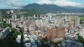 Guandu Cityscape and Mountain, Taipei, Taiwan, Aerial Rising