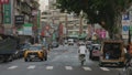 Guandu, Taiwan November 27- Bustle in Guandu Street Scene with Cars, Daytime