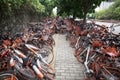 A lot of broken sharing bike crowded on the street in guangzhou china