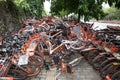 A lot of broken sharing bike crowded on the street in guangzhou china