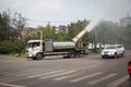 Water spraying truck on the road,this truck is for make down the pm2.5 and dust