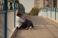 Guangzhou, China - MARCH 15, 2016: Homeless man sleeping near the road Royalty Free Stock Photo