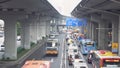 Guangzhou, China - May, 2019: Urban highway with traffic under bridges in China. Media. Busy traffic during rush hour in Royalty Free Stock Photo